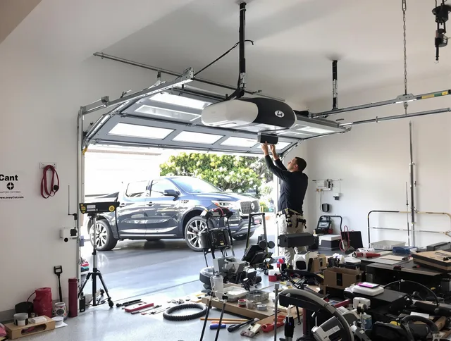 Stratford Garage Door Repair specialist installing smart garage door opener system in Stratford home